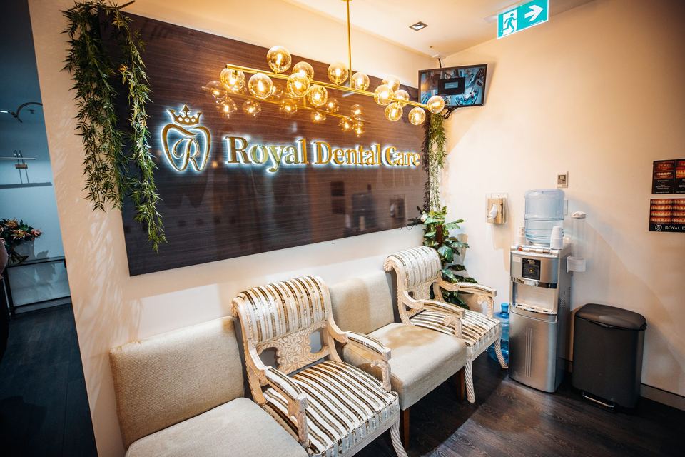 Royal Dental Care reception with illuminated sign
